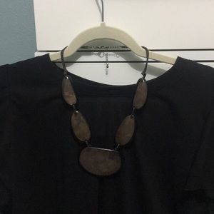 Necklace with leather &!brown/taupe disc